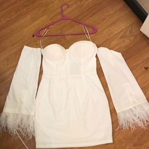 Off shoulder white dress with fringe wrists